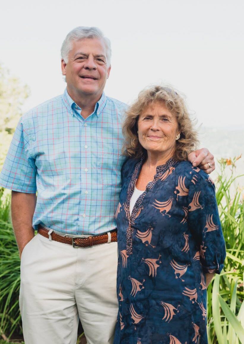 Robert and Mignon Ervin smiling man and women standing next to one another